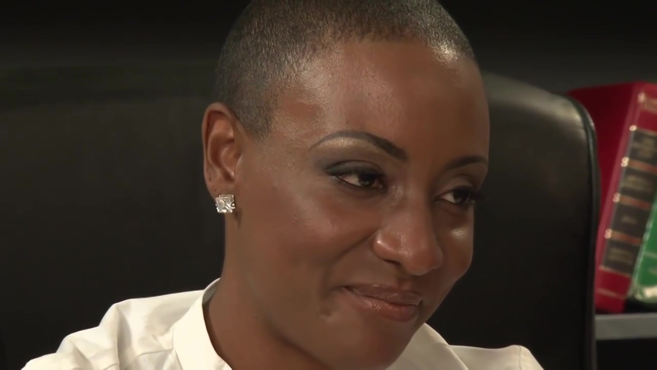 Busty black babe with bald head likes the way her white employee is fucking  her brains out